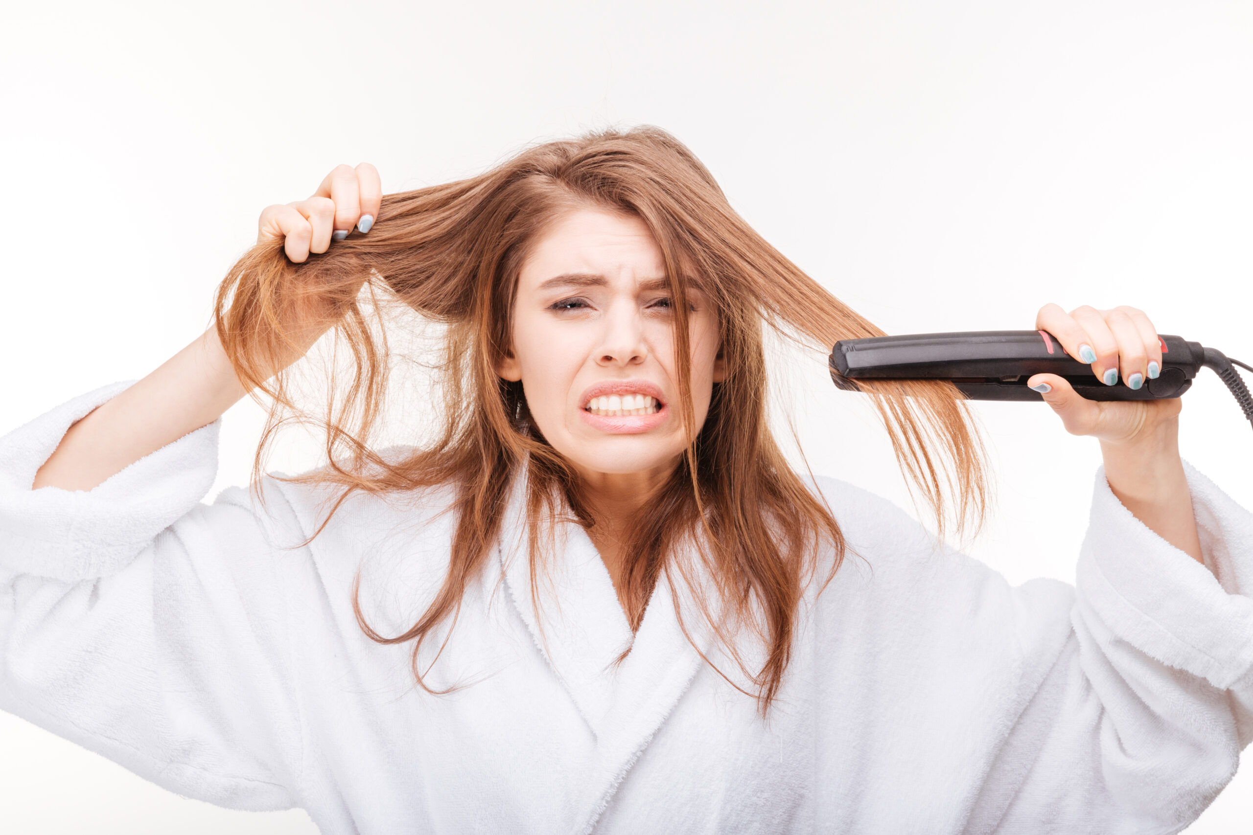 Learn to prevent hair damage from flat irons
